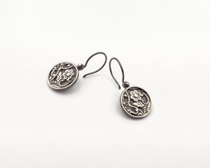 Ornamental dangle earrings