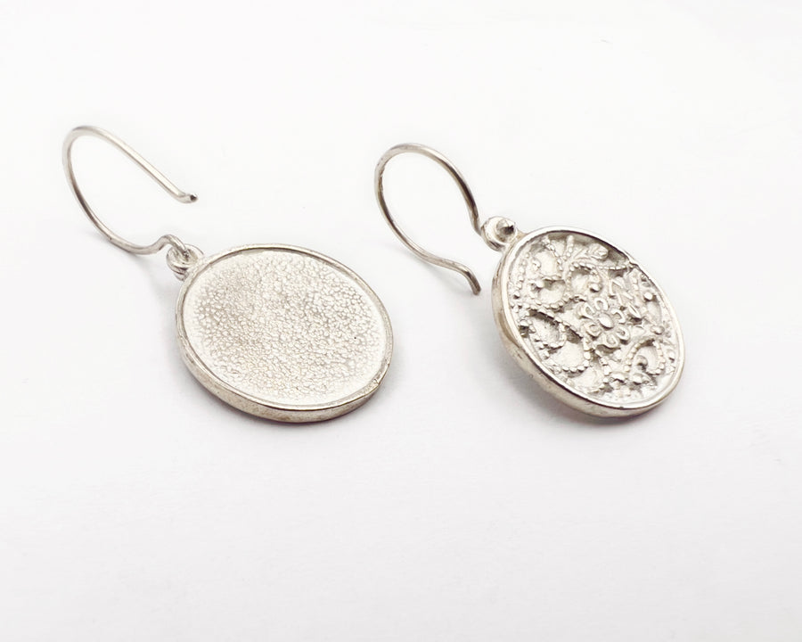 Ornamental dangle earrings