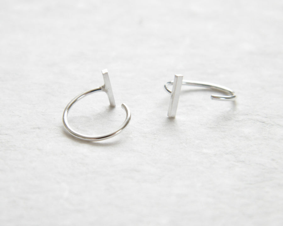 Bar hugging hoops
