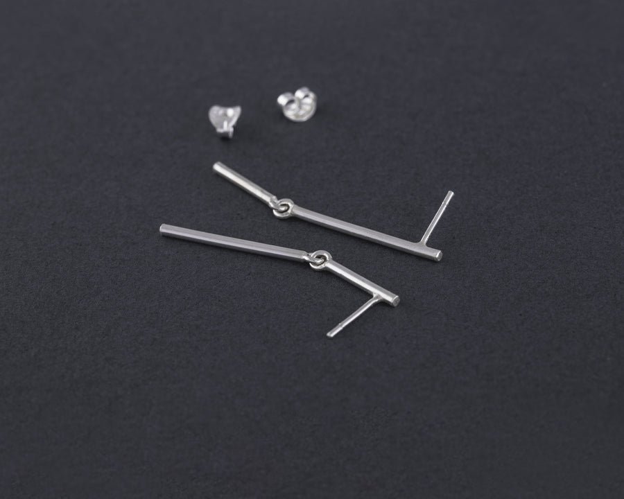 Stick mismatched earrings