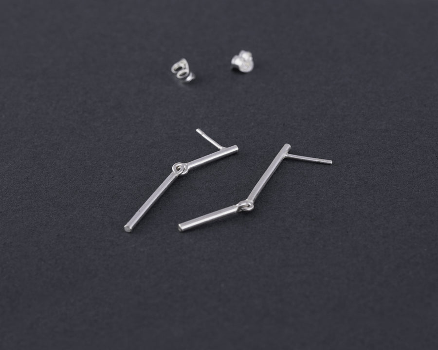 Stick mismatched earrings