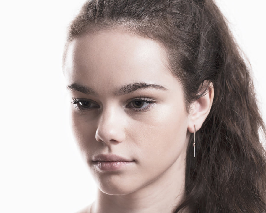 Stick mismatched earrings