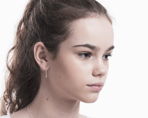 Zircon dangling earrings