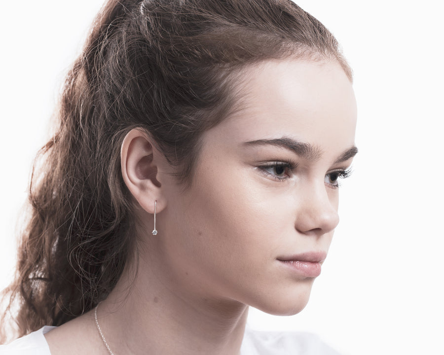 Zircon dangling earrings