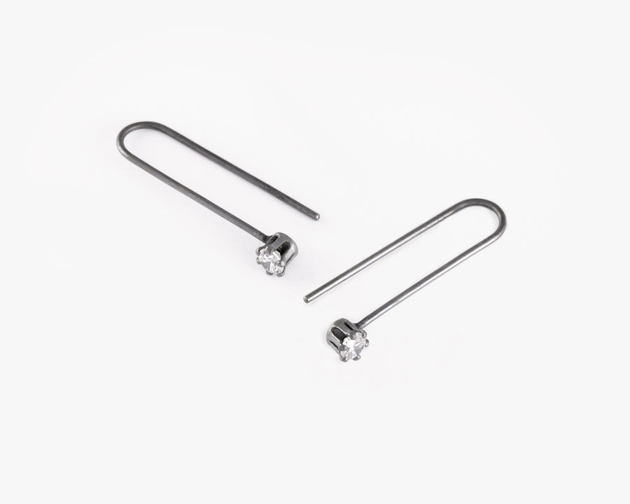 Zircon dangling earrings